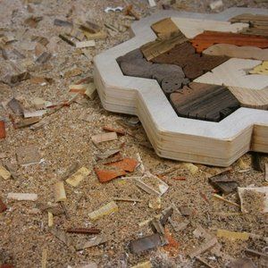 Wooden puzzle snowflake frame